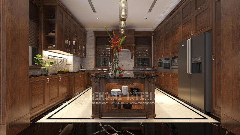 Thiết kế tủ bếp gỗ óc chó tân cổ điển tại Hà Nội kết hợp bàn đảo vừa mang lại độ bền cao, vừa biến một phần nhà bếp thành quầy bar hay bàn ăn phụ thuận tiện Tủ bếp đẹp, tủ bếp đẹp hiện đại, tủ bếp An Cường, tủ bếp cao cấp
