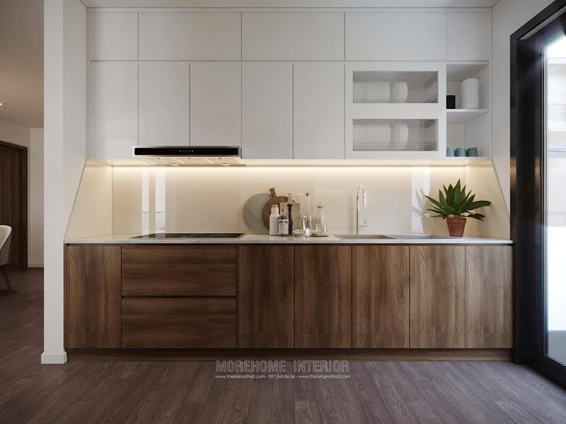 Tủ bếp dưới được làm từ gỗ công nghiệp, màu nâu trầm sang trọng, ngăn tủ cỡ lớn tạo sự thuận tiện cho việc cất, chứa đồ đạc của người nội trợ. Nội thất phòng bếp